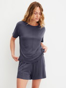 Women model is wearing Loungeshorts made of Modal in Blue, Unicoloured from the Natural Loungewear series by CALIDA, Outfit