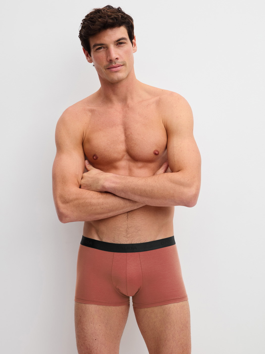 Men model is wearing Boxer Briefs, 3-Pack made of Cotton in Black, Motif from the Cotton Special series by CALIDA, Outfit