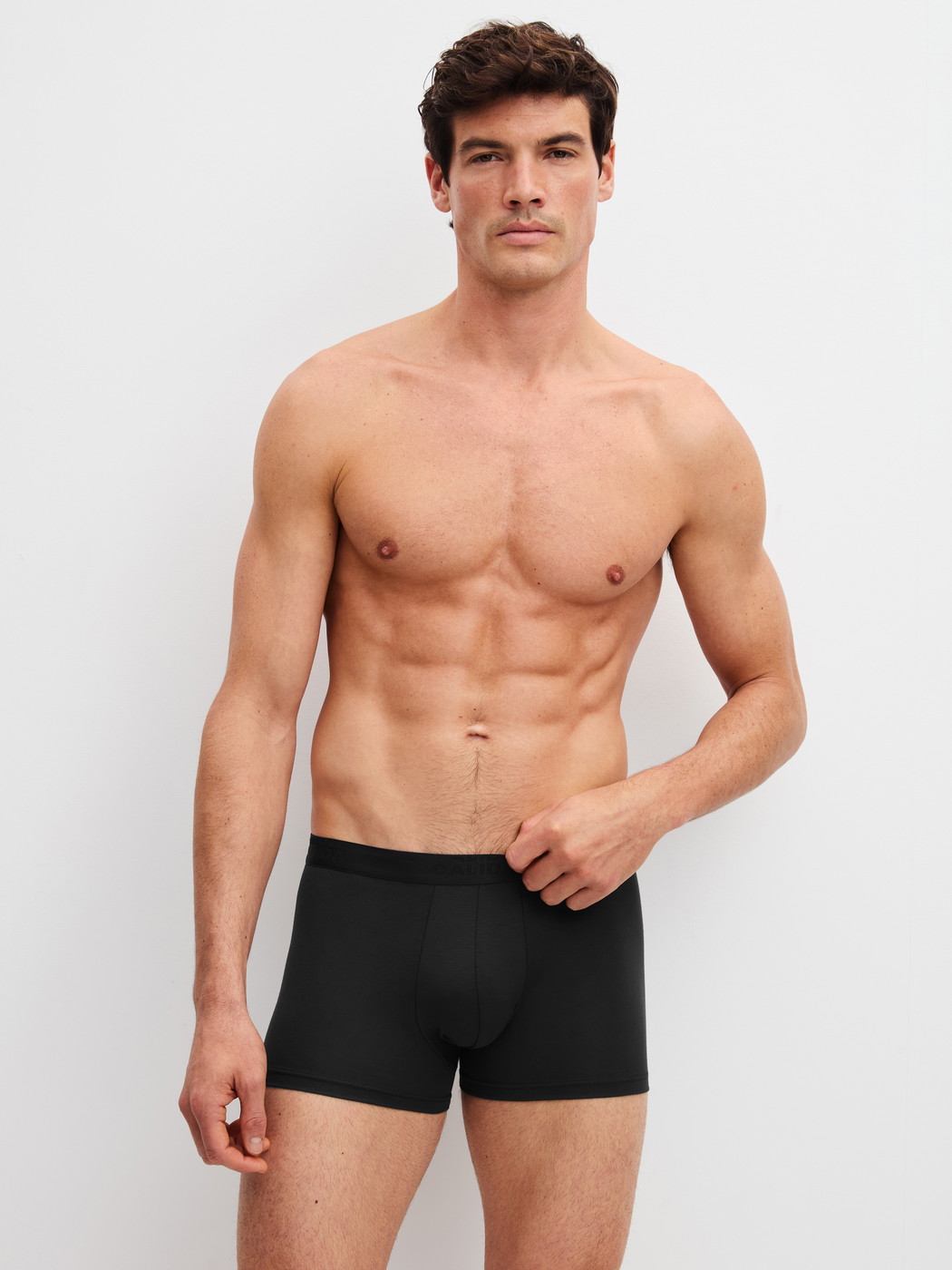 Men model is wearing Boxer Briefs, 3-Pack made of Cotton in Black, Motif from the Cotton Special series by CALIDA, Additional Image