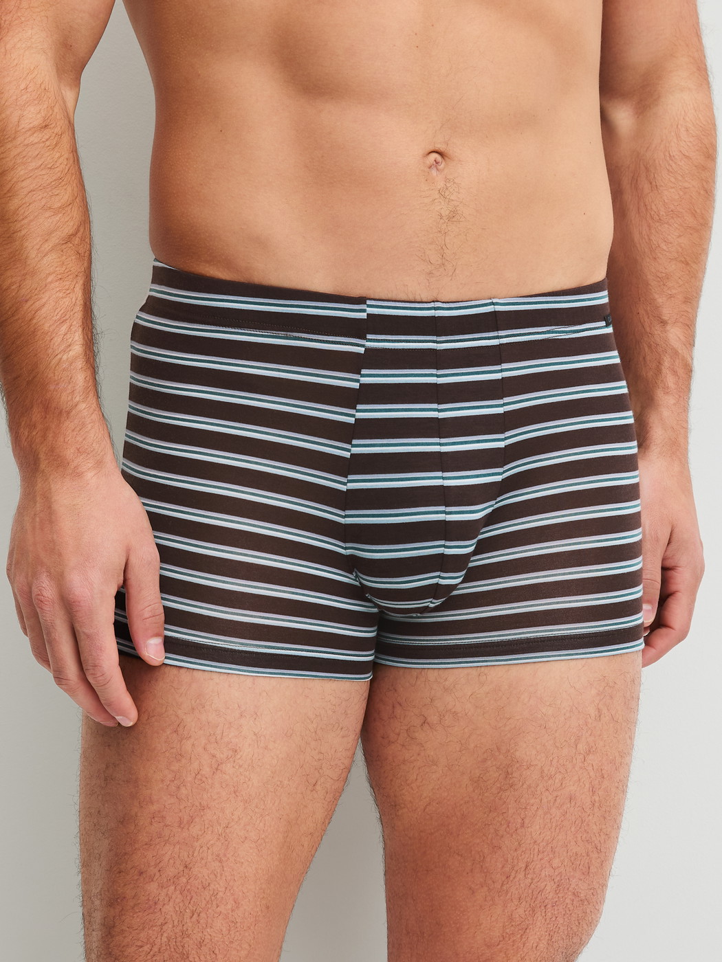 Men model is wearing Boxer brief made of Lyocell in Brown, Striped from the Focus Trend series by CALIDA, Front view