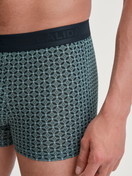 Men model is wearing Boxer brief made of TENCEL™ in Green, Patterned from the Focus Trend series by CALIDA, Detail