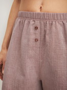 Women model is wearing Pyjama shorts made of 100% Cotton in Brown, Unicoloured from the Favourites Tiles series by CALIDA, Detail