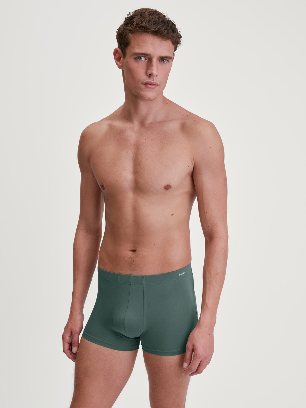 Men model is wearing Boxerbrief made of Modal in Green, Unicoloured from the Balanced Day series by CALIDA, Outfit