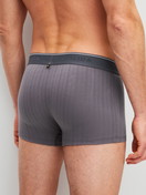 Men model is wearing Boxer brief, elastic waistband made of Cotton in Grey, Unicoloured from the Pure & Style series by CALIDA, Back view