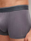 Men model is wearing Boxer brief, elastic waistband made of Cotton in Grey, Unicoloured from the Pure & Style series by CALIDA, Detail
