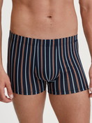 Men model is wearing Boxer brief made of Cotton in Orange, Striped from the Grafic Cotton series by CALIDA, Front view