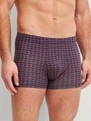 Men model is wearing Boxer brief made of Pima® Cotton in Grey, Patterned from the Grafic Cotton series by CALIDA, Front view