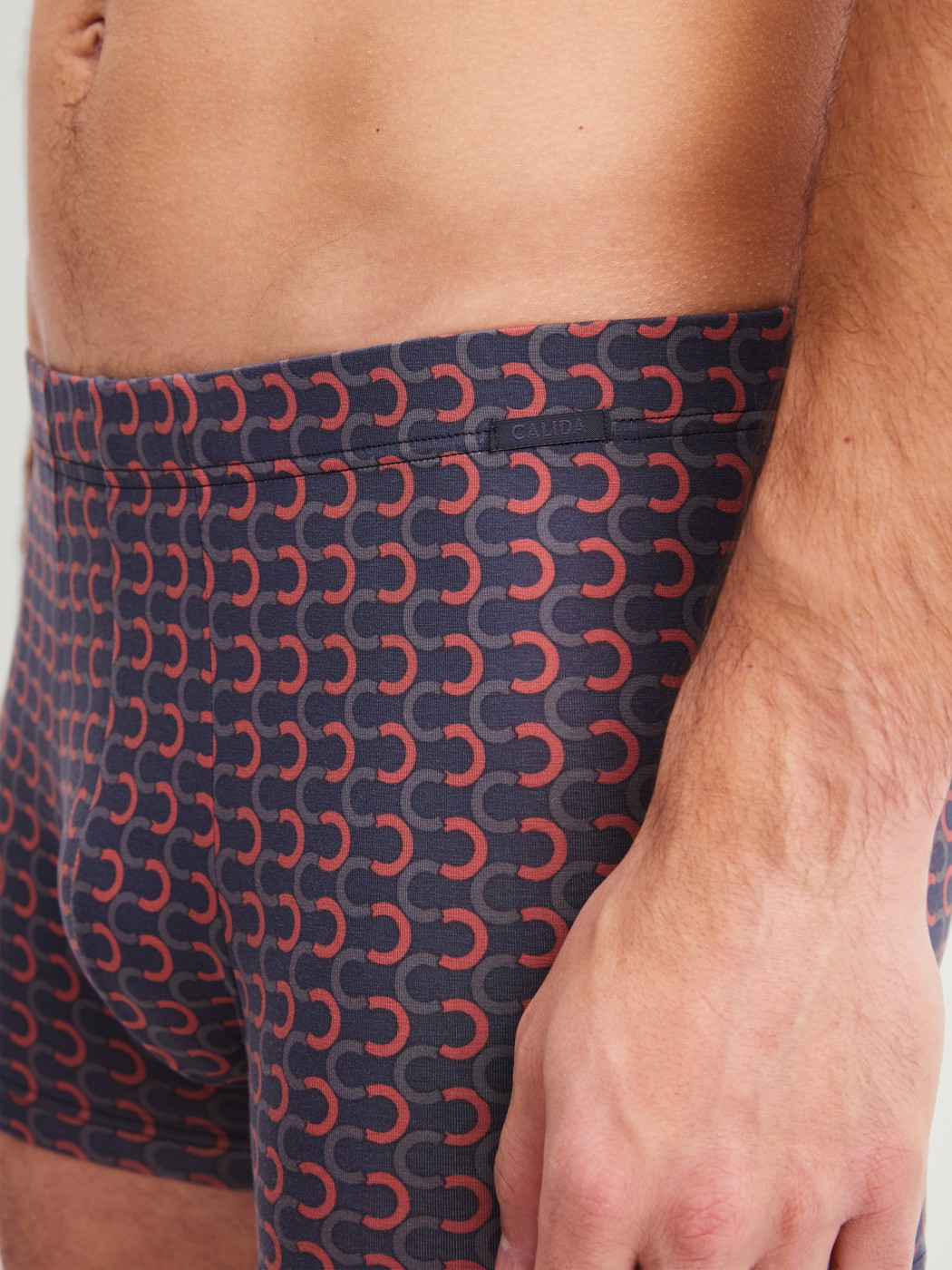 Men model is wearing Boxer brief made of Pima® Cotton in Grey, Patterned from the Grafic Cotton series by CALIDA, Detail