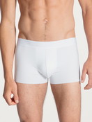Men model is wearing Boxer brief with elastic waistband made of Modal in White, Unicoloured from the Clean Line series by CALIDA, Front view