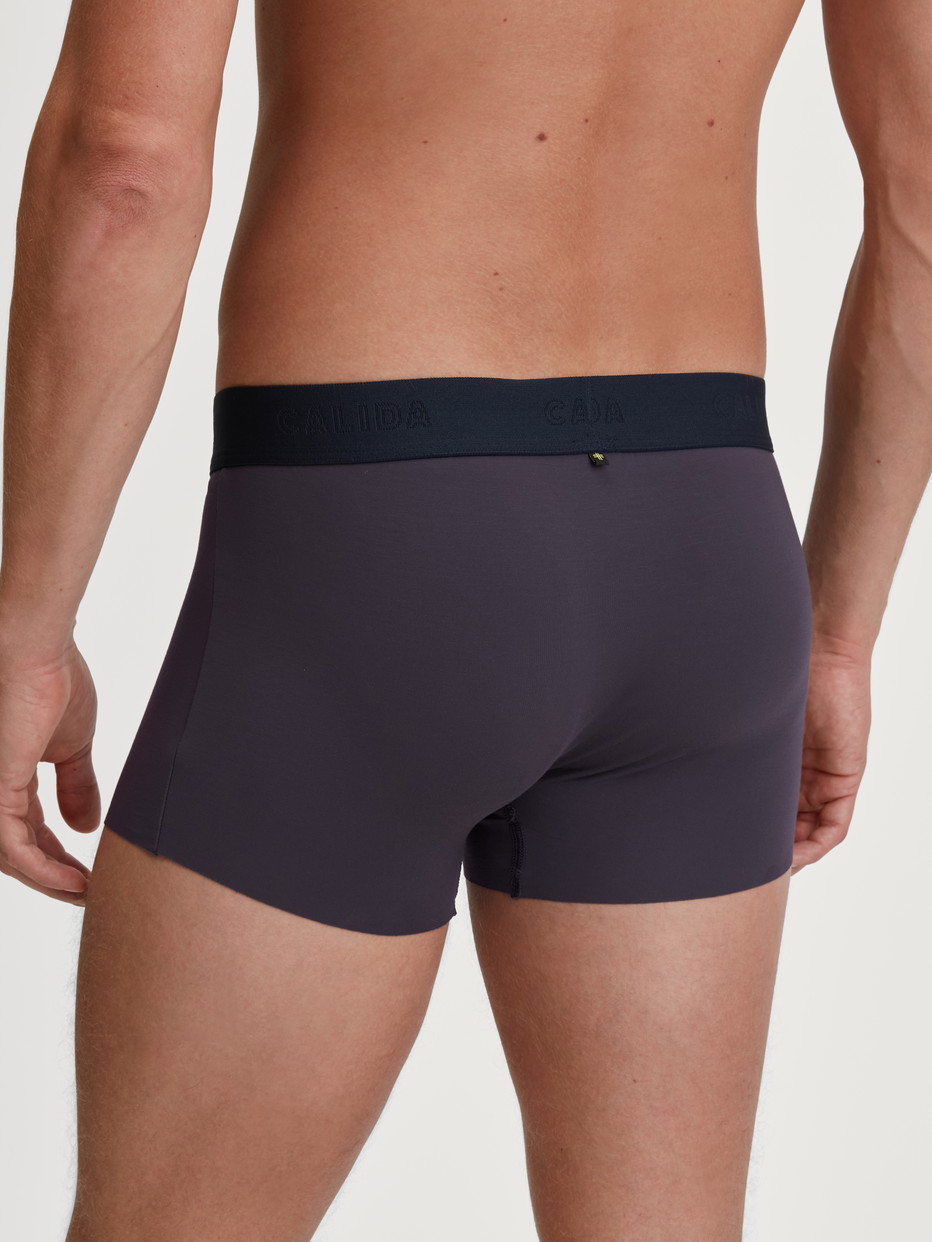 Men model is wearing Boxer brief with elastic waistband made of TENCEL™ in Blue, Unicoloured from the Clean Line series by CALIDA, Back view
