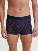 La modella / Il modello Uomo indossa Boxer brief in Cotone di colore Rosso, Modello, della serie Cotton Code Design di CALIDA, Vista frontale