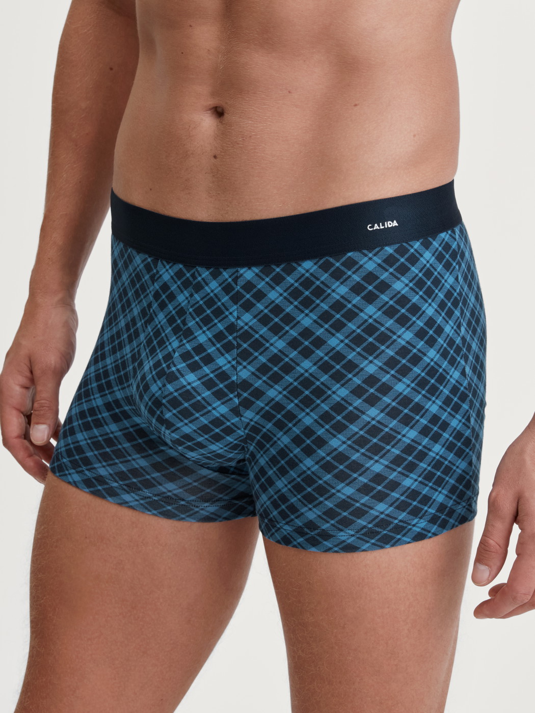 Men model is wearing Boxer brief made of Cotton in Blue, Checked from the Cotton Code Design series by CALIDA, Front view