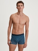 Men model is wearing Boxer brief made of Cotton in Blue, Checked from the Cotton Code Design series by CALIDA, Outfit