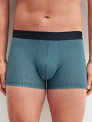 La modella / Il modello Uomo indossa Boxer brief in Cotone di colore Blu, Modello, della serie Cotton Code Design di CALIDA, Vista frontale