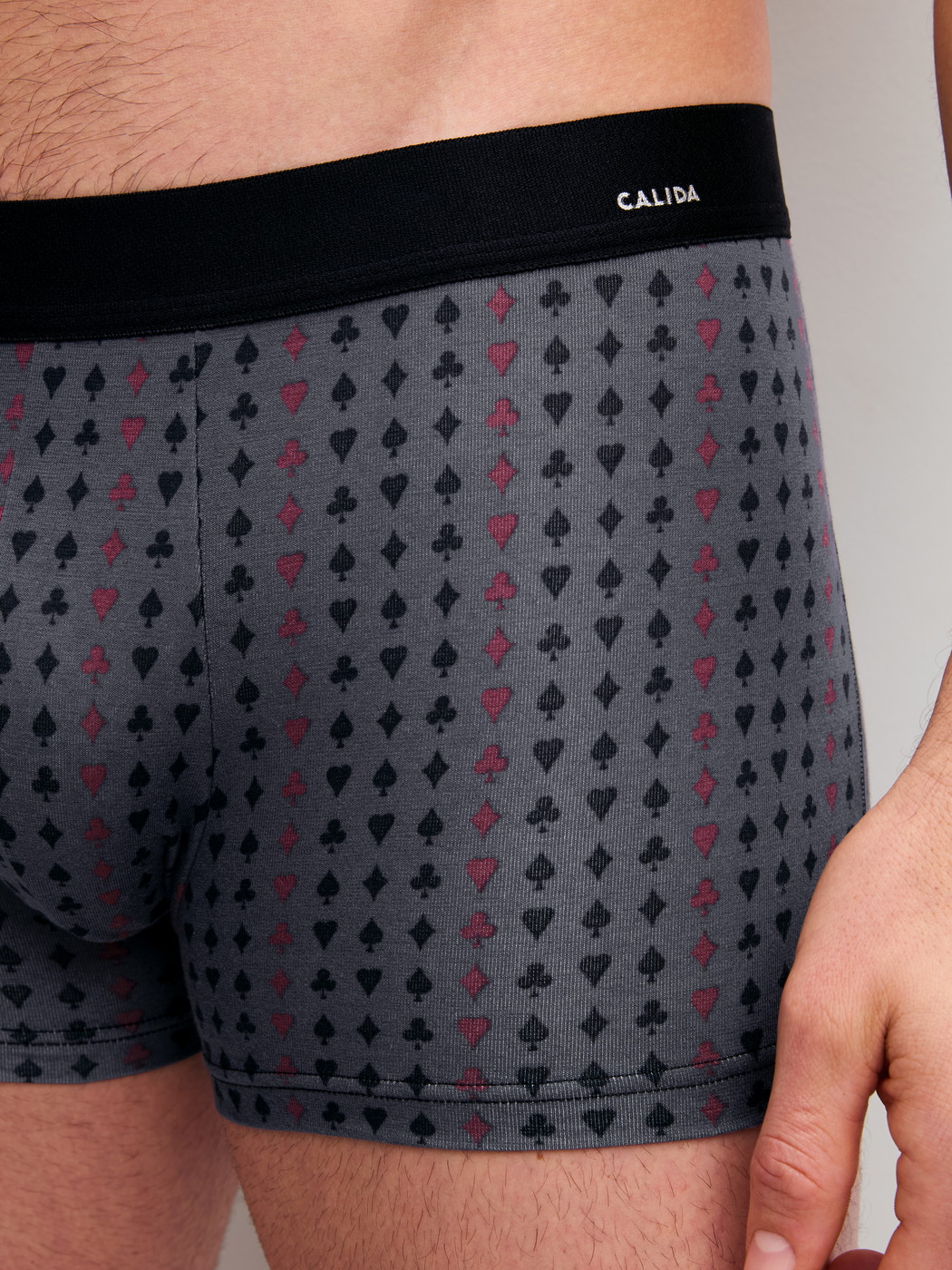 Men model is wearing Boxer brief made of Cotton in Grey, Patterned from the Cotton Code Design series by CALIDA, Detail