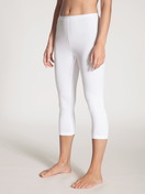 Women model is wearing 3/4 Leggings made of Cotton in White, Unicoloured from the Natural Comfort series by CALIDA, Front view
