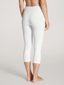 Women model is wearing 3/4 Leggings made of Cotton in White, Unicoloured from the Natural Comfort series by CALIDA, Back view