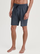 Men model is wearing Bermudas made of 100% Cotton in Blue, Checked from the Remix Basic Sleep series by CALIDA, Front view