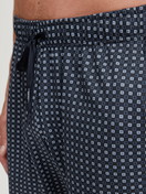 Men model is wearing Bermudas made of 100% Cotton in Blue, Checked from the Remix Basic Sleep series by CALIDA, Detail
