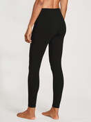 Women model is wearing Leggings made of Modal in Black, Unicoloured from the Lounge & Relax series by CALIDA, Back view