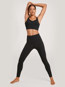 Women model is wearing Leggings made of Modal in Black, Unicoloured from the Lounge & Relax series by CALIDA