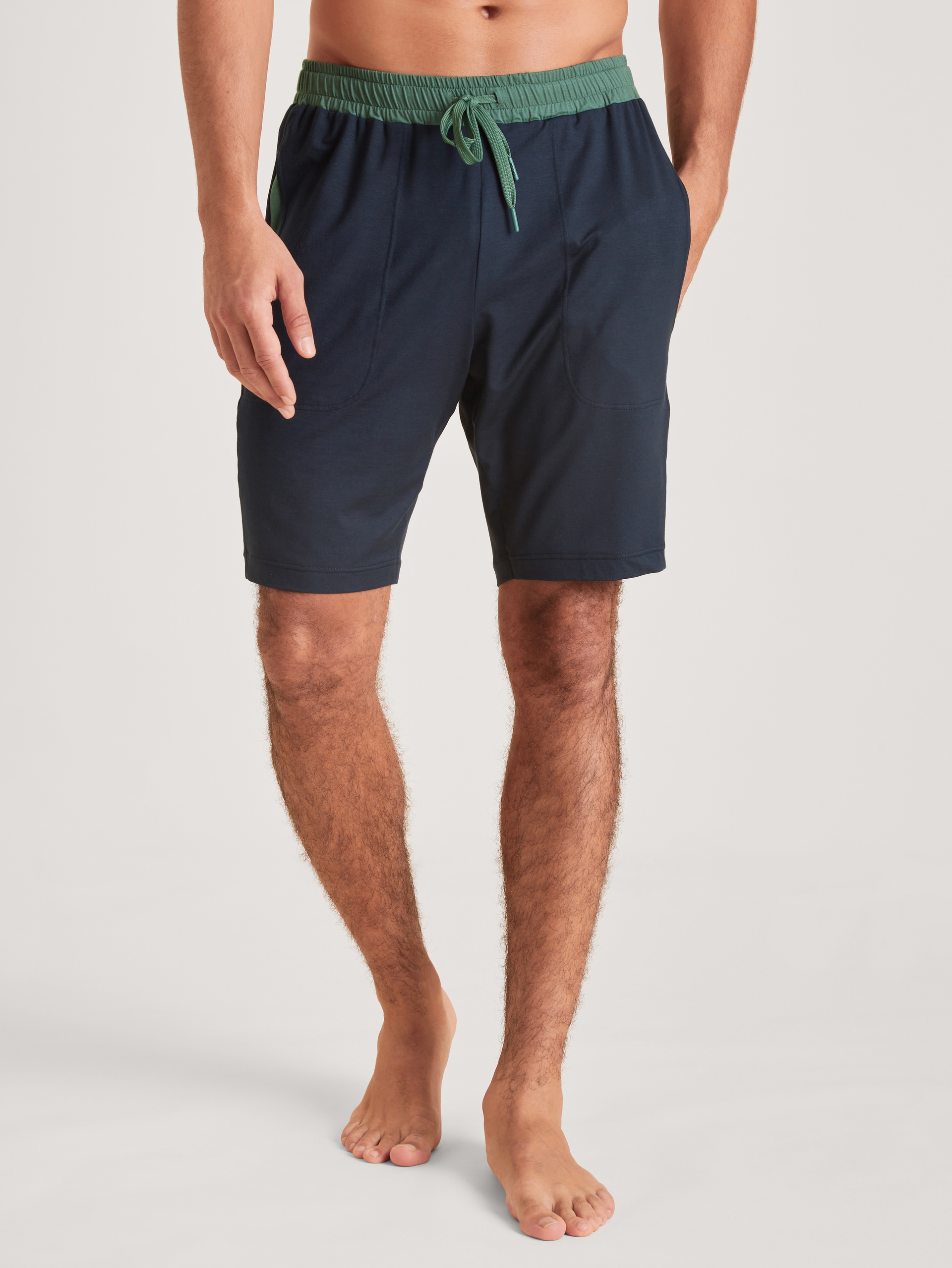 Men model is wearing Shorts made of Modal in Blue, Unicoloured from the DSW Balancing series by CALIDA, Front view