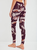Women model is wearing Leggings made of Cotton in Red, Floral from the Elastic Trend Spec. series by CALIDA, Back view