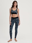 Women model is wearing Leggings made of Cotton in Black, Floral from the Elastic Trend series by CALIDA, Outfit