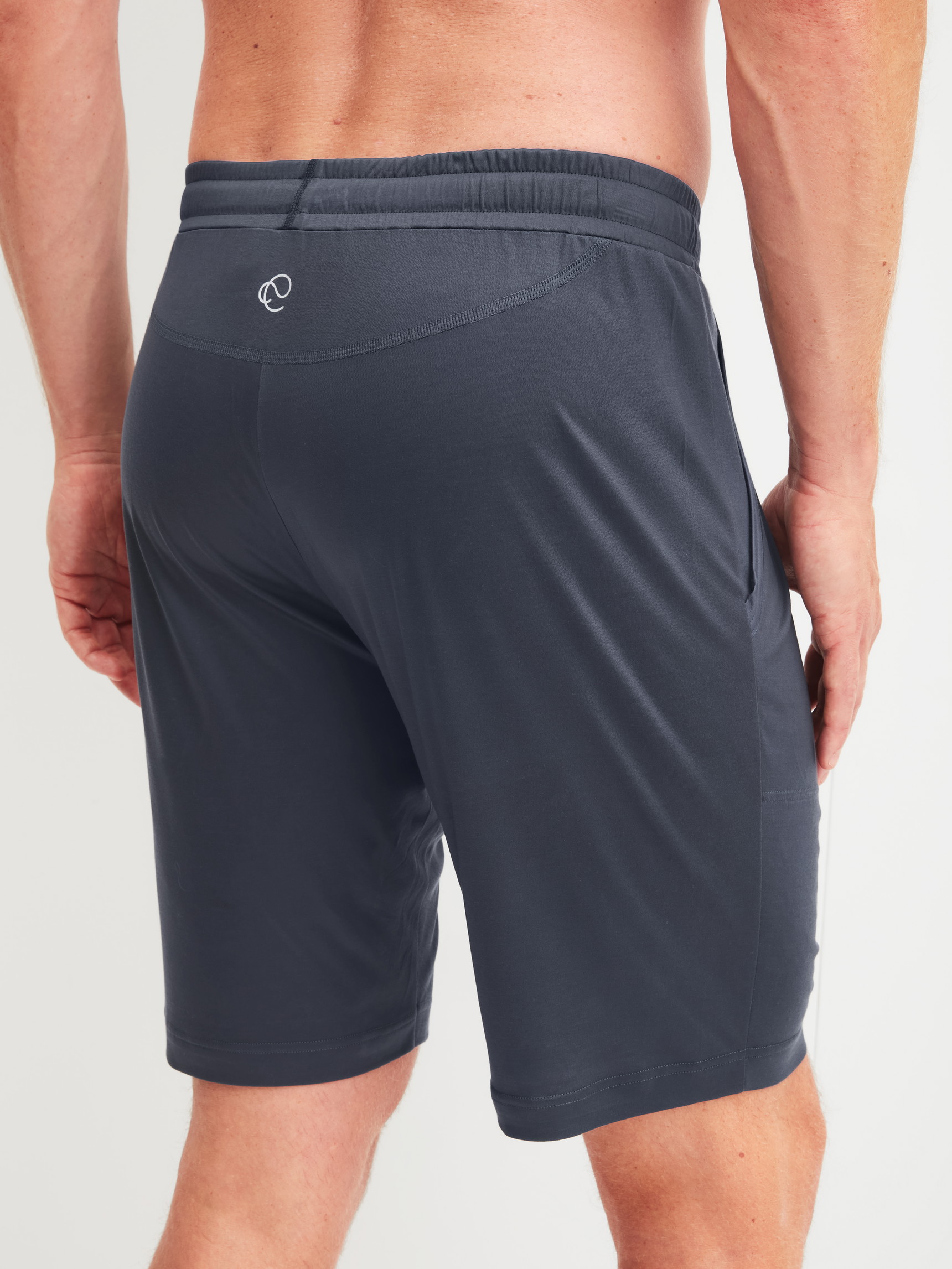 Men model is wearing Shorts made of Lyocell in Grey, Unicoloured from the DSW Cooling series by CALIDA, Back view