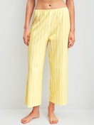 Women model is wearing 7/8 pyjama trousers made of 100% Cotton in Yellow, Striped from the Favourites Ocean series by CALIDA, Front view