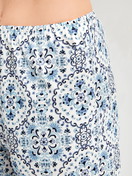 Women model is wearing 3/4 Pyjama bottom made of 100% Cotton in Blue, Patterned from the Favourites Tiles series by CALIDA, Detail