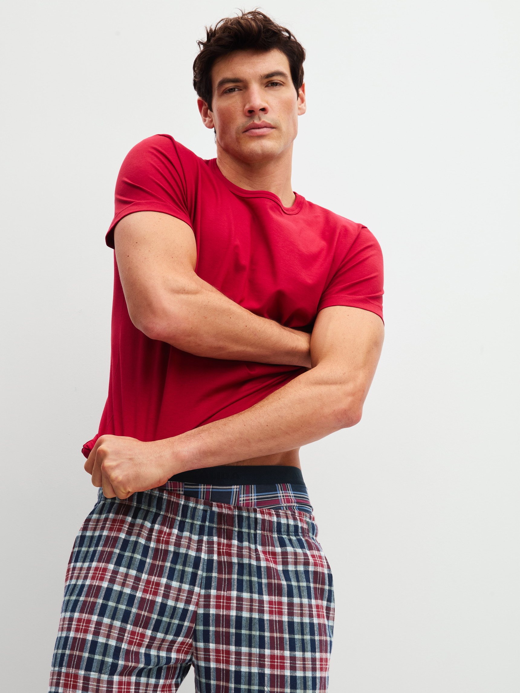 Men model is wearing Flannel trousers with side pockets made of 100% Cotton in Blue, Checked from the Family & Friends series by CALIDA, Additional Image