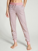 Women model is wearing Pyjama bottom made of 100% Cotton in Pink, Striped from the Favourites Dreams series by CALIDA, Front view