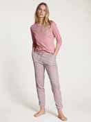 Women model is wearing Pyjama bottom made of 100% Cotton in Pink, Striped from the Favourites Dreams series by CALIDA, Front view, Outfit