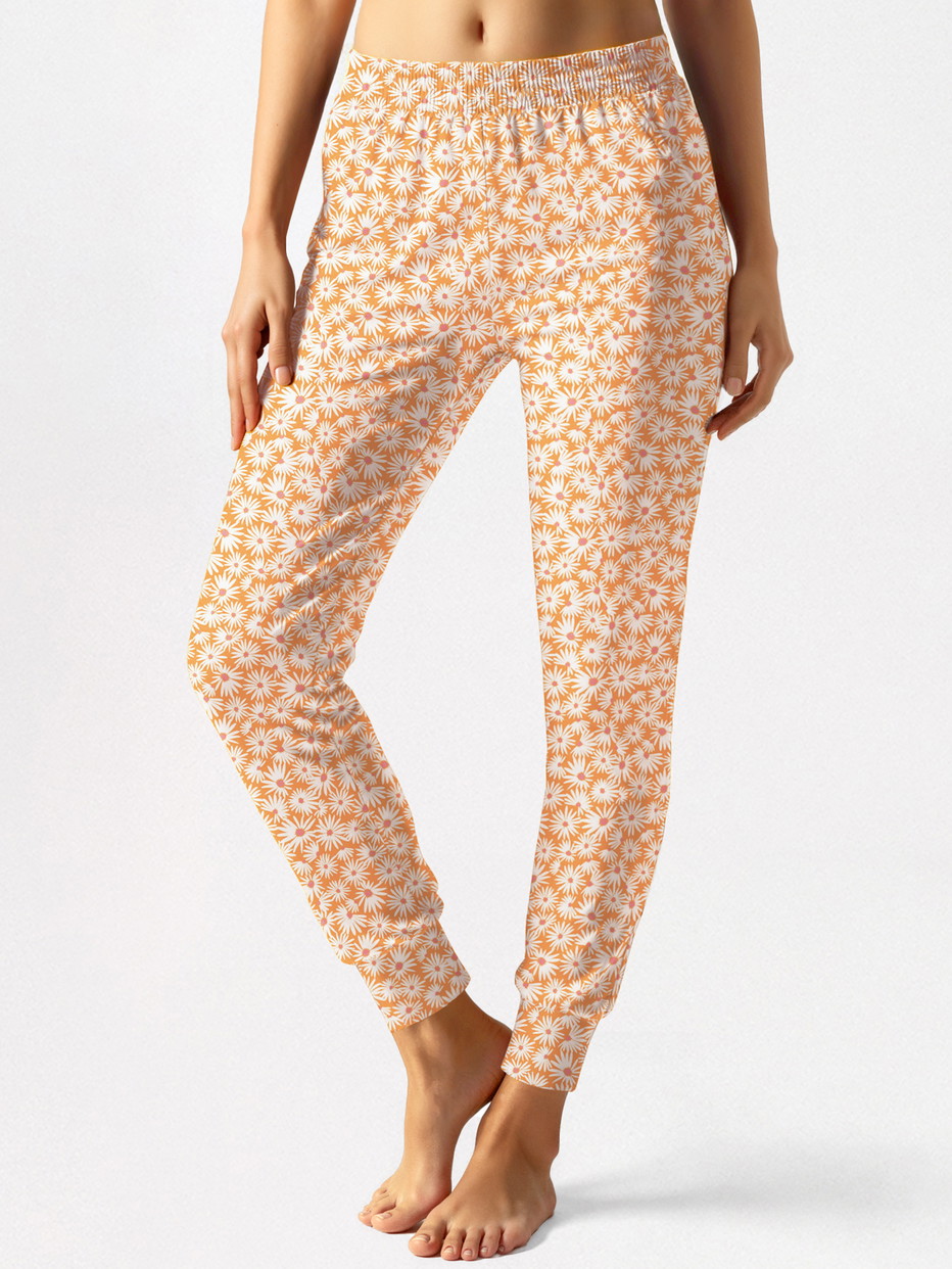 Women model is wearing Pyjama bottom made of 100% Cotton in Yellow, Patterned from the Favourites Xtra series by CALIDA, Front view