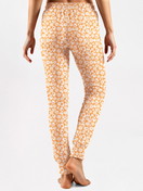 Women model is wearing Pyjama bottom made of 100% Cotton in Yellow, Patterned from the Favourites Xtra series by CALIDA, Back view