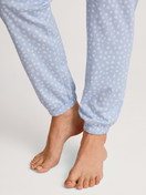 Women model is wearing Pyjama bottom with cuffs made of 100% Cotton in Blue, Patterned from the Favourites Sleep series by CALIDA, Detail