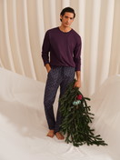 La modella / Il modello Uomo indossa Pantaloni da notte con tasche in 100% cotone di colore Marrone, Modello, della serie RMX Sleep Holiday di CALIDA, Immagine aggiuntiva