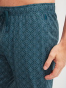 Men model is wearing Pyjama Bottoms with Side Pockets made of 100% Cotton in Turquoise, Patterned from the RMX Sleep Leisure series by CALIDA, Detail