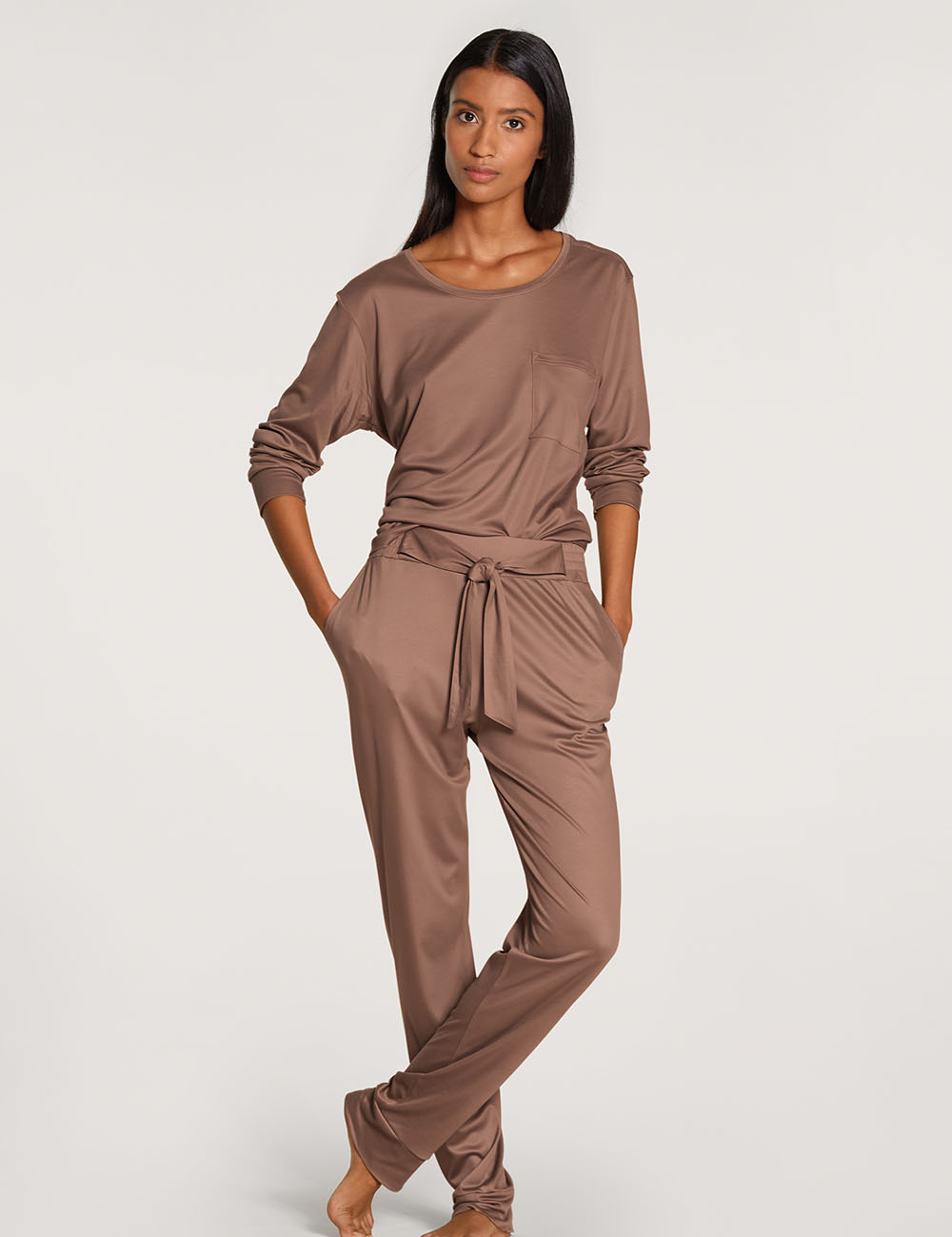 Women model is wearing Pants made of Lyocell in Brown, Unicoloured from the Circular Sleep series by CALIDA, Outfit