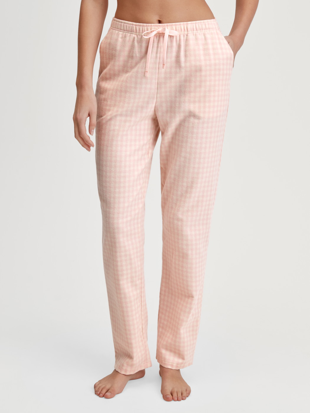 Women model is wearing Flannel trousers made of 100% Cotton in Beige, Unicoloured from the Favourites Universe series by CALIDA, Front view