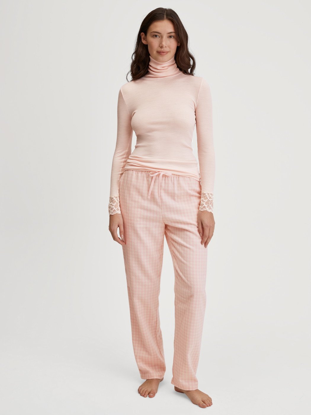 Women model is wearing Flannel trousers made of 100% Cotton in Beige, Unicoloured from the Favourites Universe series by CALIDA, Outfit