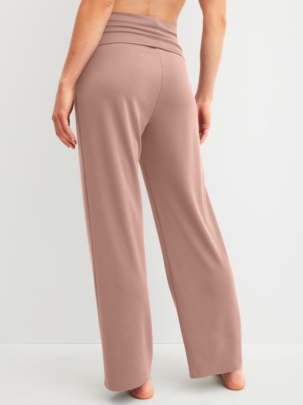 Women model is wearing Lounge Pants made of Modal in Brown, Unicoloured from the Natural Loungewear series by CALIDA, Back view