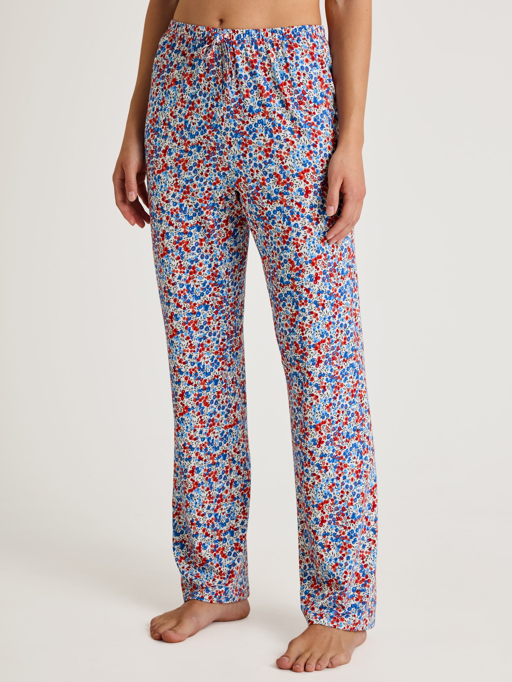 Women model is wearing Pants made of Cotton in Blue, Floral from the Season Special series by CALIDA, Front view