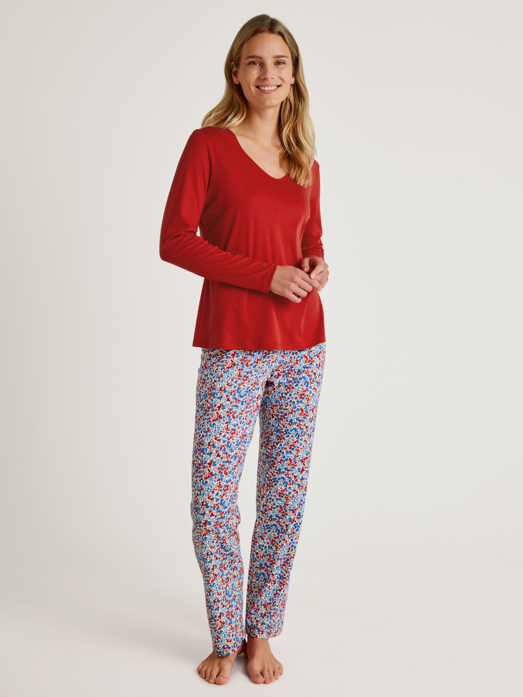 Women model is wearing Pants made of Cotton in Blue, Floral from the Season Special series by CALIDA, Outfit