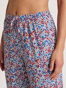 Women model is wearing Pants made of Cotton in Blue, Floral from the Season Special series by CALIDA, Detail