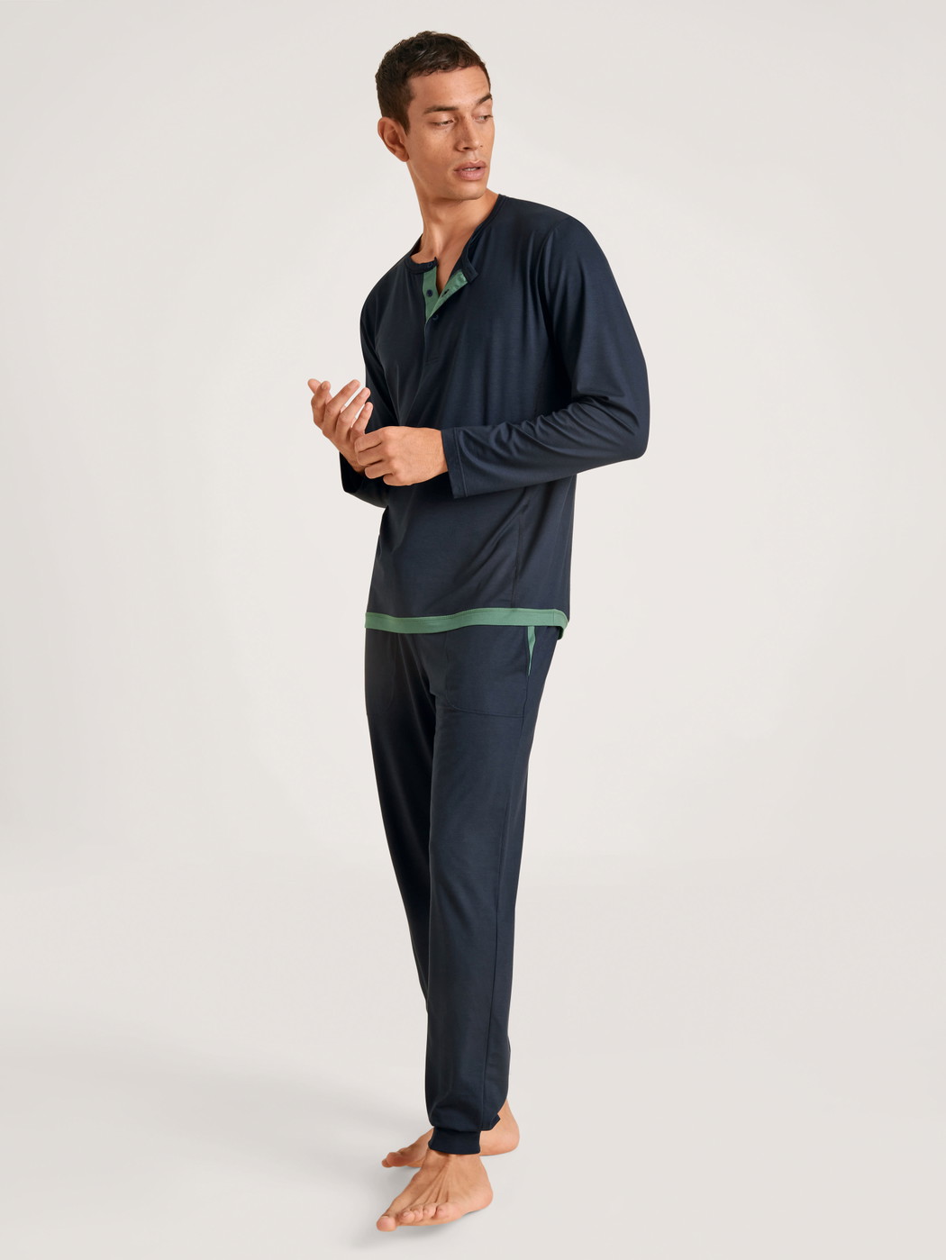 Men model is wearing Pyjama bottom with cuffs made of Modal in Blue, Unicoloured from the DSW Balancing series by CALIDA, Outfit