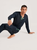 Men model is wearing Pyjama bottom with cuffs made of Modal in Blue, Unicoloured from the DSW Balancing series by CALIDA