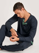 Men model is wearing Pyjama bottom with cuffs made of Modal in Blue, Unicoloured from the DSW Balancing series by CALIDA