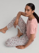 Women model is wearing Pyjama bottom made of 100% Cotton in White, Floral from the Favourites Dreams series by CALIDA